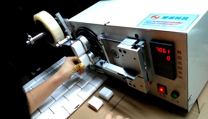 小米充電器自動包膜機實物圖 小米充電器自動包膜機實物圖